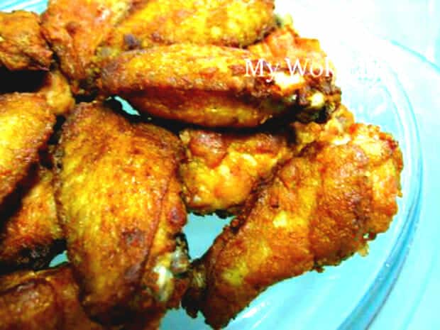 Fried chicken wing with preserved red tofu cubes