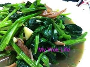 Stir fried spinach with stewed pork chop