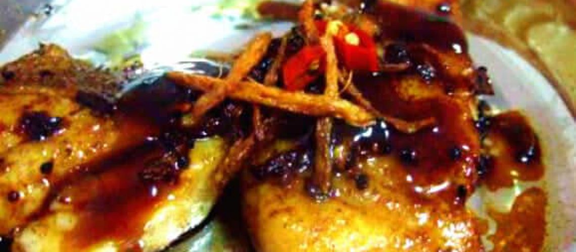 Fried fish fillet in shallot oil and oyster sauce